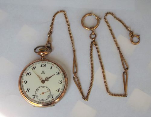 fig 1. Antique galonne style pocket watch and chain