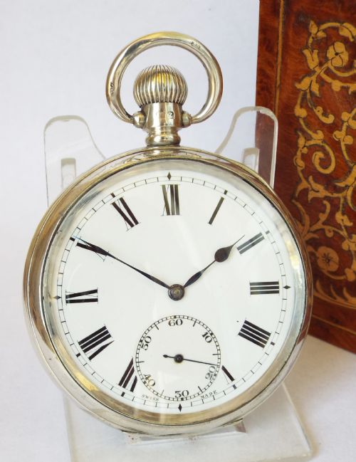 A 1920s Silver Visible Stem Winding Pocket Watch.