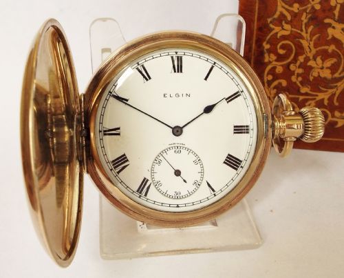A 1920s Elgin Full Hunter Pocket Watch.