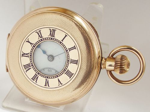 A 1920s Stem Winding Half Hunter Pocket Watch.