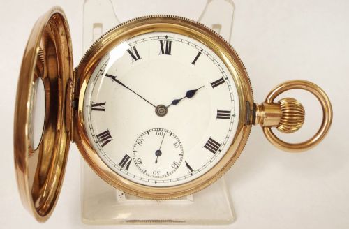 fig 1. A 1920s stem winding half hunter pocket watch.