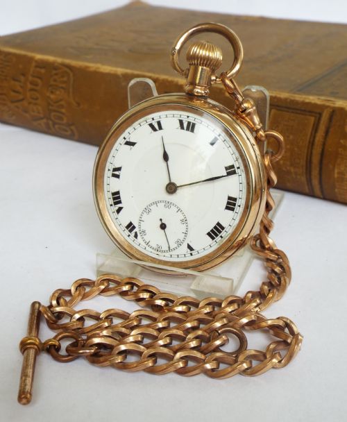 fig 1. 1920s Swiss open faced pocket watch and chain