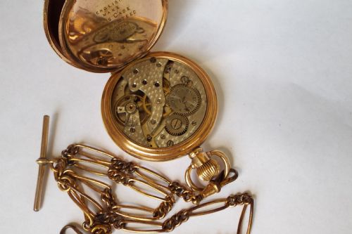 fig 1. 1930s Swiss pocket watch and double albert