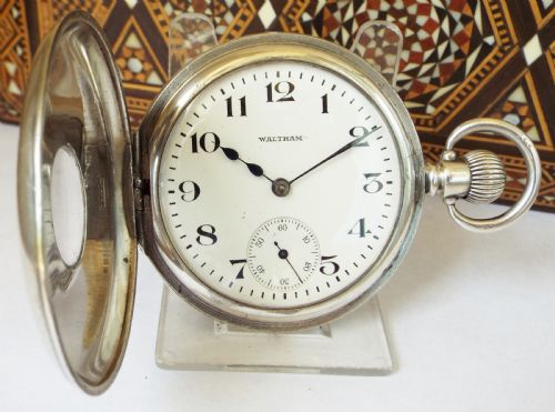 fig 1. A 1920s silver half hunter Waltham pocket watch.
