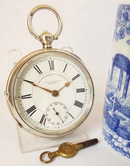 An Antique "Express" English Lever Sterling Silver Pocket Watch from J G Graves of Sheffield.
