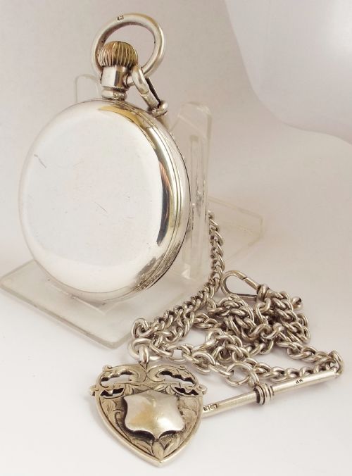 fig 1. An antique silver Waltham Marquis pocket watch & chain.