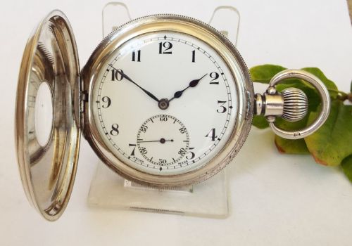 fig 1. A 1920s silver half hunter selezi pocket watch.