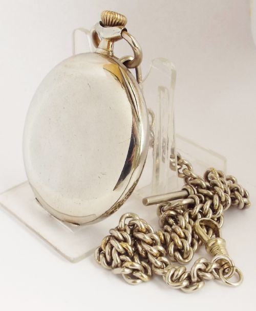 fig 1. An antique 1917 Omega pocket watch and chain .