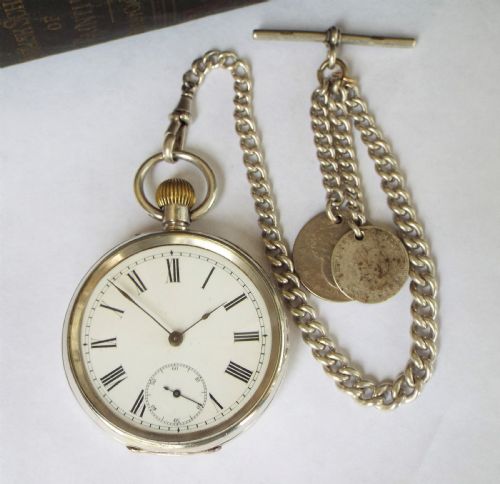 fig 1. Antique Swiss silver pocket watch and chain