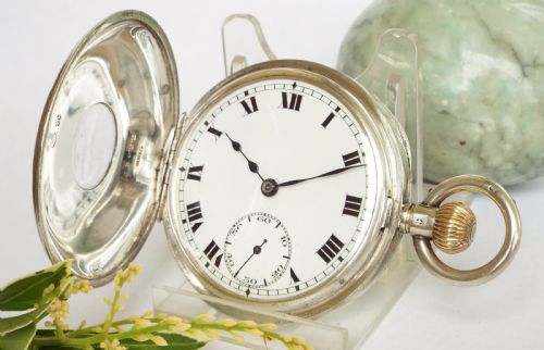 fig 1. Antique 1919 silver half hunter Record pocket watch.