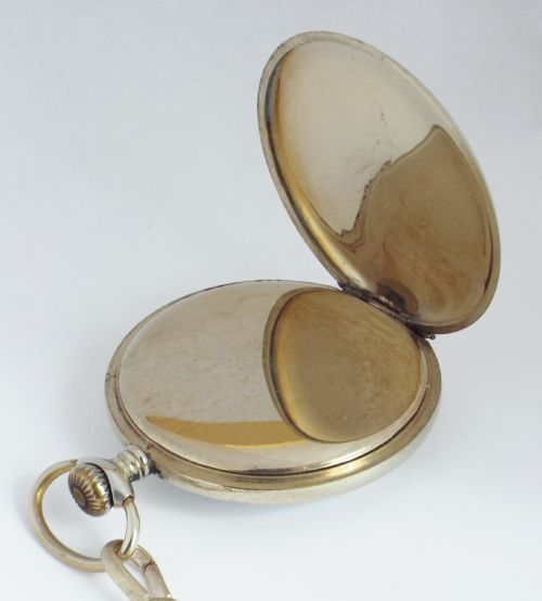 fig 2. 1920s Swiss pocket watch and chain.