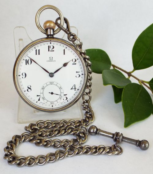 A 1930s Gun Metal Omega Pocket Watch and Chain.