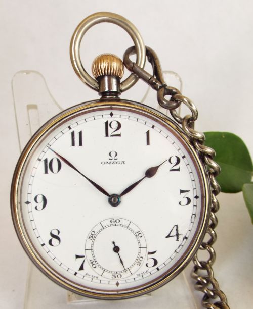 fig 1. A 1930s gun metal Omega pocket watch and chain.