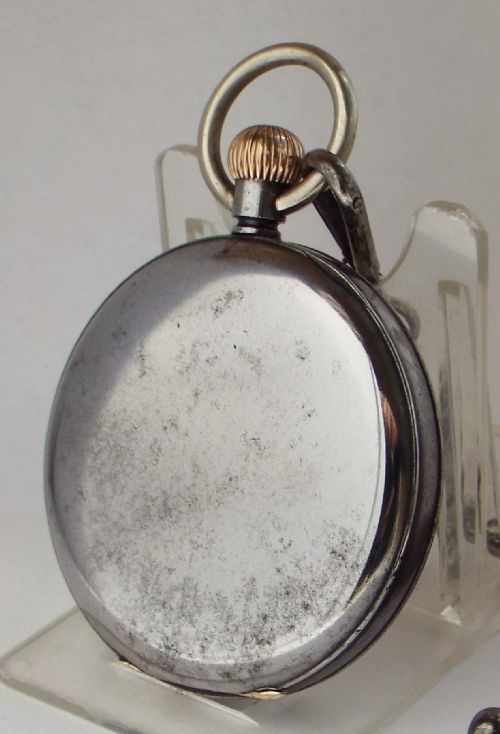 fig 2. A 1930s gun metal Omega pocket watch and chain.