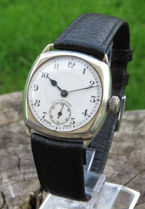 fig 1. Gents silver cushion cased wrist watch, 1927