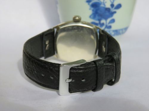 fig 2. Gents silver cushion cased wrist watch, 1927