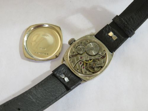 fig 3. Gents silver cushion cased wrist watch, 1927
