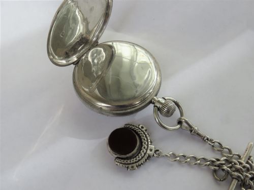 fig 2. Antique silver pocket watch with chain and swivel