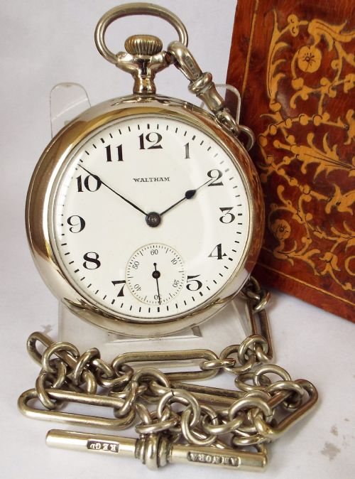 A 1920s Waltham Pocket Watch & Chain.