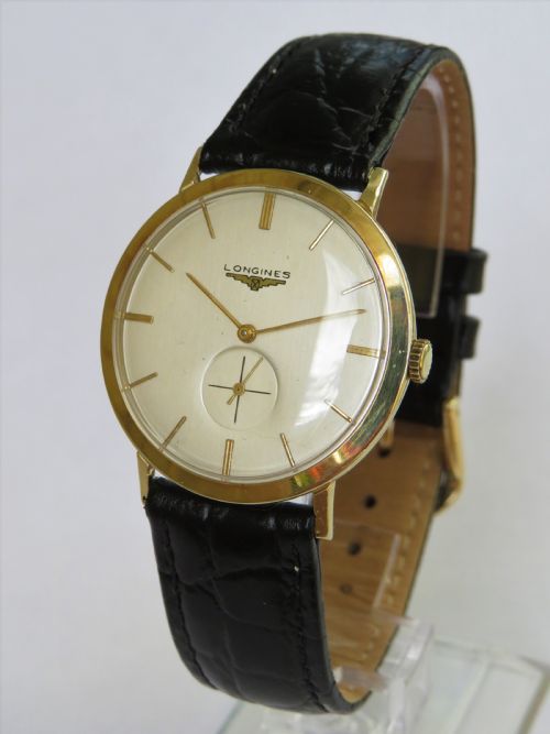 fig 1. Gents 1956 Longines 14ct gold wristwatch