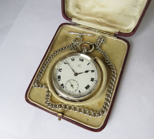 fig 1. Antique silver Omega pocket watch and chain