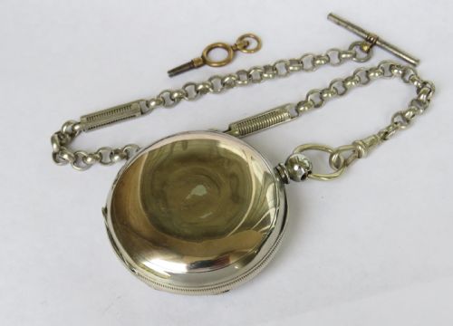 fig 1. Antique key winding pocket watch and chain.