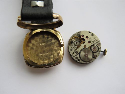 fig 2. 9ct gold Invicta mid-size wrist watch by Seeland Watch Co