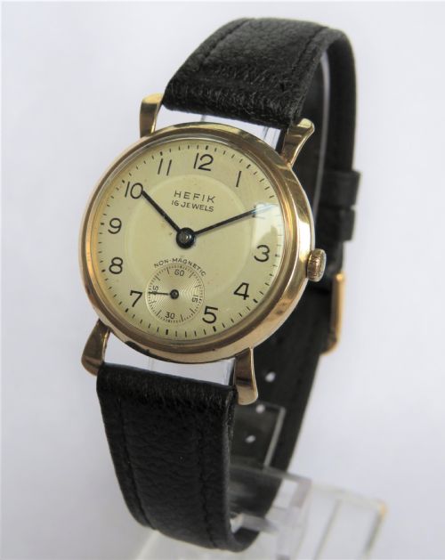 fig 1. Mid-size 9ct gold Hefik wrist watch, 1948