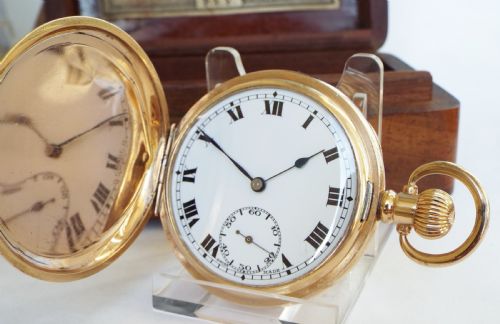 A 1920s Record Full Hunter Pocket Watch.