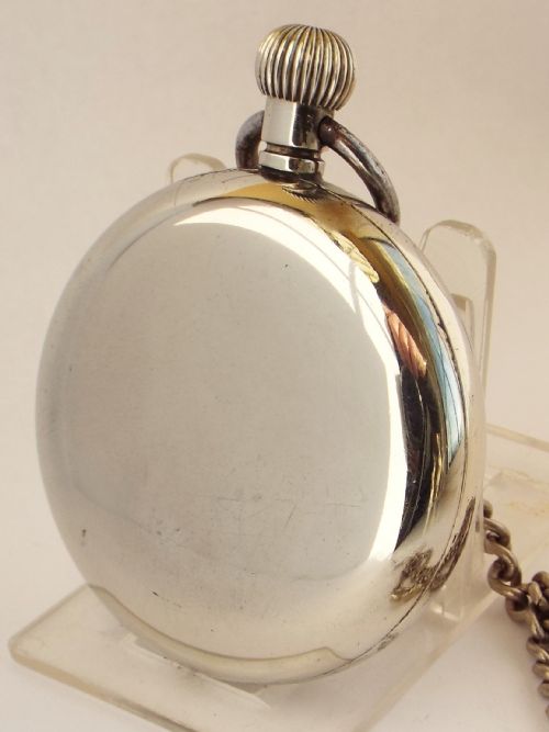 fig 1. 1920s nickel pocket watch and chain.
