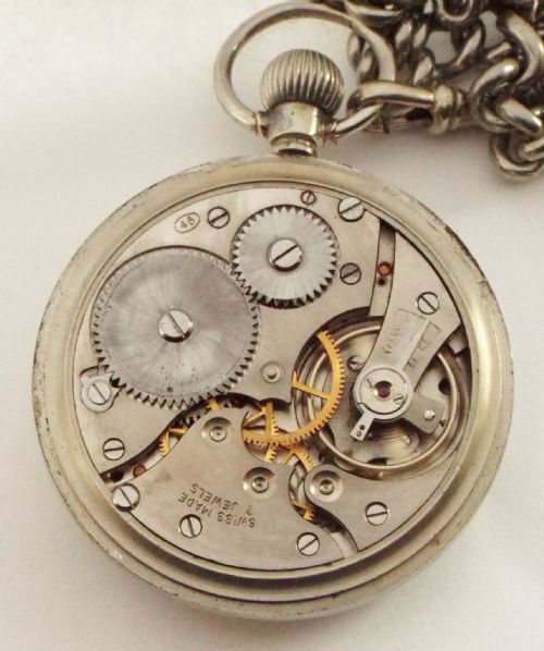 fig 1. A 1920s Pinnacle stem winding pocket watch with chain.