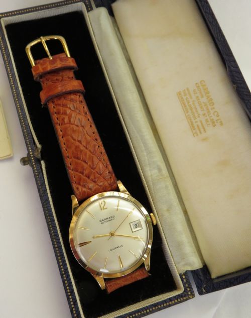 fig 2. Gents boxed 9ct gold Garrard wrist watch