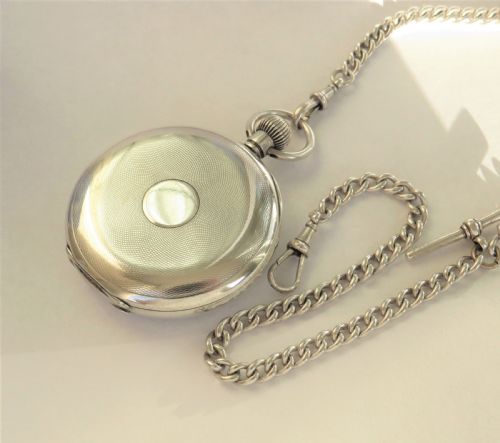 fig 1. Antique silver pocket watch and chain