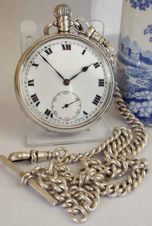 A 1920s Silver Pocket Watch and Chain.