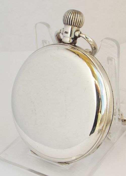 fig 1. A 1920s silver pocket watch and chain.