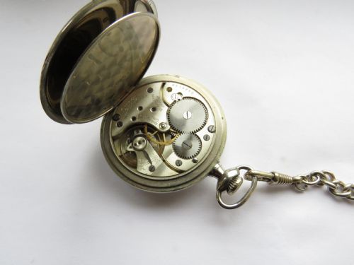 fig 2. 1925 Omega pocket watch and chain