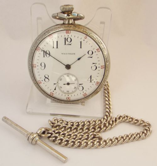 A 1922 Waltham Pocket Watch & Chain.