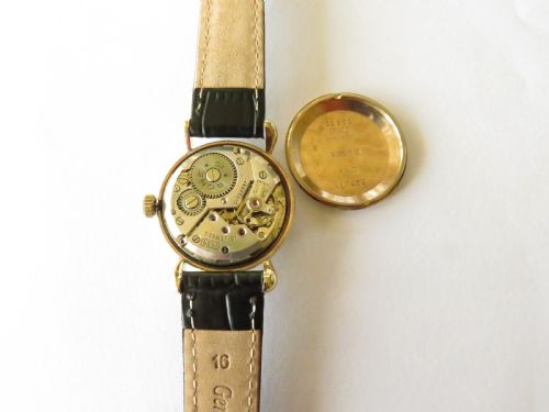 fig 1. Mid-size 9ct gold Rone Fifteen wrist watch, 1947