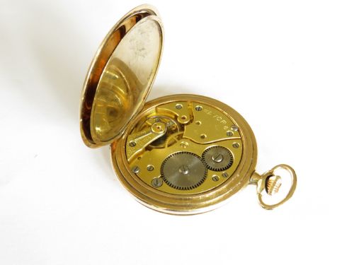 fig 1. 1930s Favor full hunter pocket watch