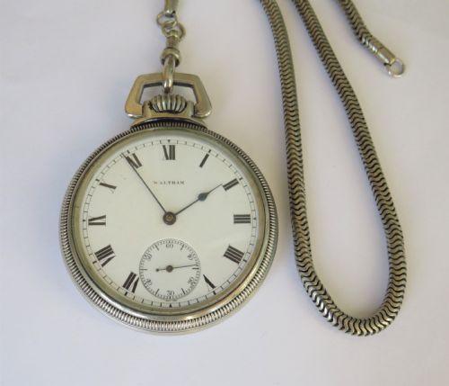 fig 1. Antique Waltham pocket watch and chain