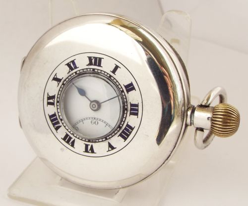 Antique Silver Syren Half Hunter Pocket Watch by the Revue Thommen Watch Company.