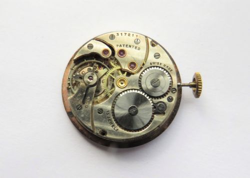 fig 3. Gents 9ct gold wrist watch, J W Benson, 1933