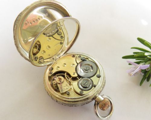 fig 2. Antique Omega ladies silver fob watch