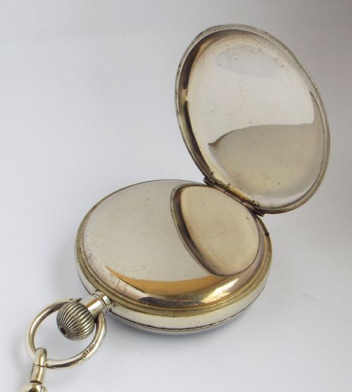 fig 3. A 1930s Cyma pocket watch & albert for J W Benson.