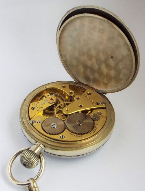 fig 4. A 1930s Cyma pocket watch & albert for J W Benson.