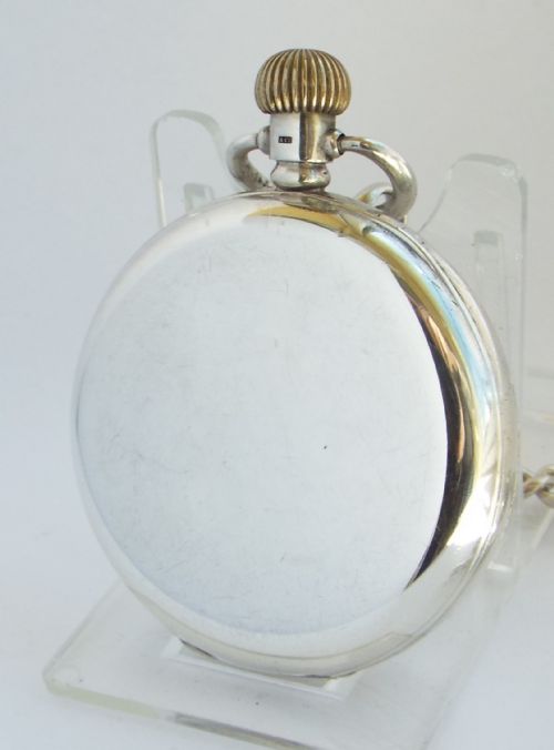 fig 1. A 1920s silver Cyma pocket watch with chain.