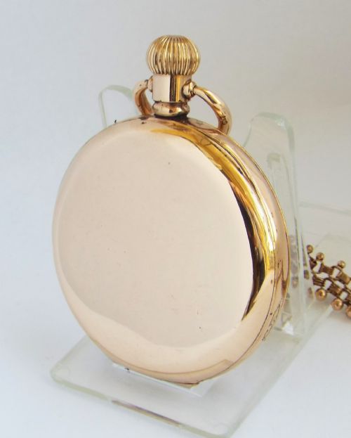 fig 2. A 1920s Cyma half hunter pocket watch & chain.