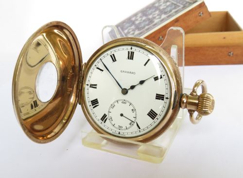 fig 1. A 1940s Garrard half hunter pocket watch.