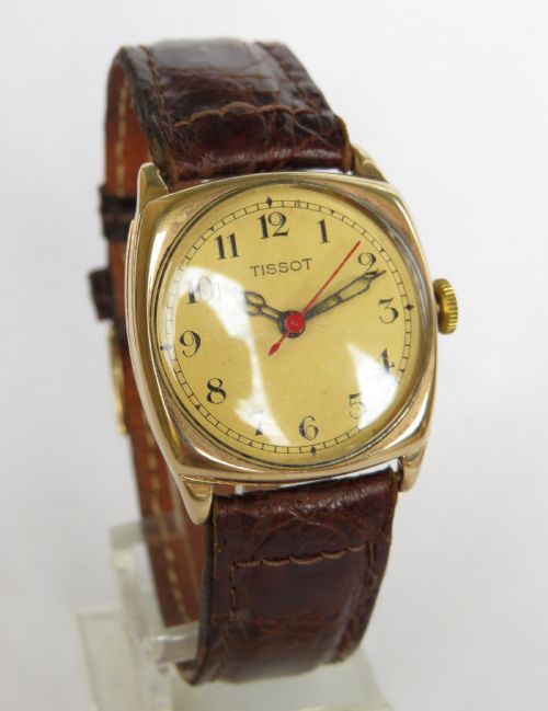 fig 1. Mid-size 9ct gold cushion cased wrist watch, 1931