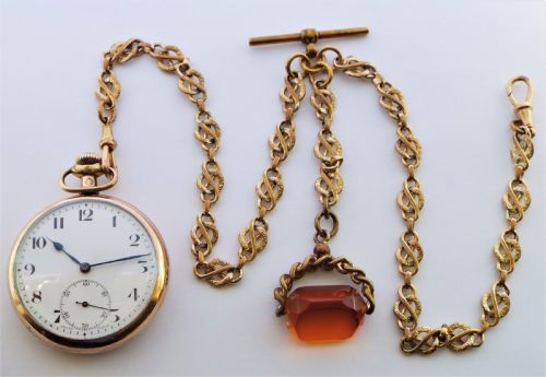 fig 2. A 1920s stem winding pocket watch by Tavannes, with double albert.